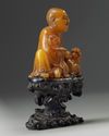 A Chinese soapstone carving of a Luohan