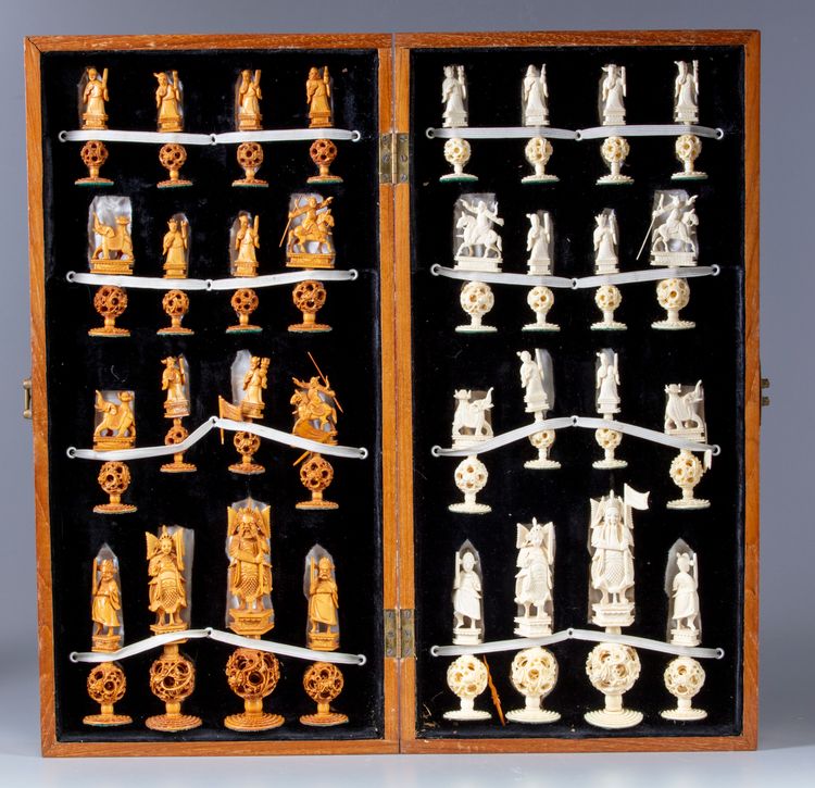 A Chinese wooden chess game with ivory pins