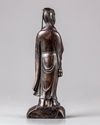 A Chinese bronze figure of a lady