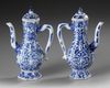 A PAIR OF CHINESE BLUE AND WHITE HEXAGONAL EWERS AND COVERS, KANGXI PERIOD (1662–1722)