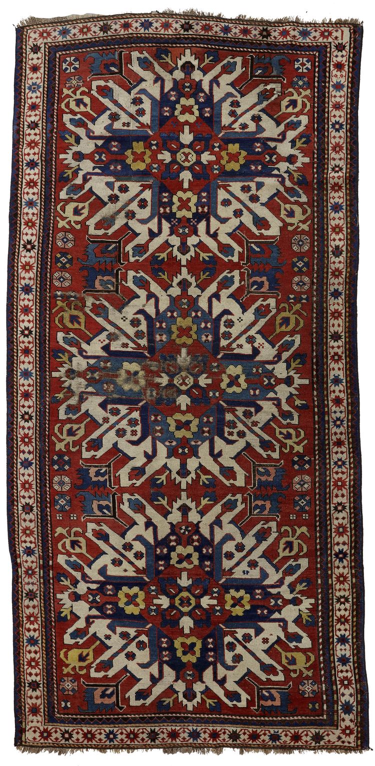 A CAUCASIAN KAZAK ADLER (CHALEBERD) RUG, 19TH CENTURY