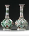 A pair of Chinese famille verte hexagonal bottle vases