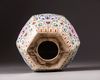 A CHINESE CELADON GROUND FAMILLE ROSE PORCELAIN PILLOW, LATE QING DYNASTY (1644-1911)