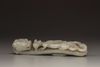 A celadon jade 'dragon' belt hook