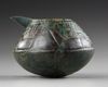 A WESTERN ASIATIC BRONZE SPOUTED VESSEL, CIRCA 8TH-7TH CENTURY B.C.