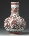 A CHINESE IRON-RED BOTTLE VASE