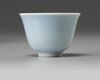 A small Chinese pale-blue glazed cup