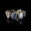 A LATE GEORGIAN GRAND TOUR GILT METAL LAVA, CORAL CAMEO RING, 19TH CENTURY