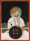 A PORTRAIT OF A RAJA SMOKING A HUQQA MEWAR, NORTH INDIA, MID-19TH CENTURY