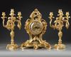 A FRENCH ORMOLU CLOCK SET, 19TH CENTURY