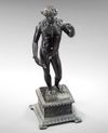 A ROMAN BRONZE STATUETTE OF APOLLO CARNEUS, CIRCA 1ST-2ND CENTURY A.D.