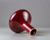 A Chinese= red glazed bottle vase