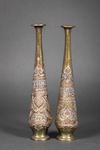 A FRENCH PAIR OF EMBOSSED BRASS VASES