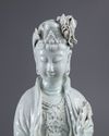 AN EXCEPTIONAL LARGE DEHUA GLAZED FIGURE OF A GUANYIN WITH A CHILD, 20TH CENTURY