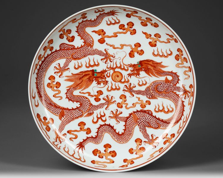 A CHINESE IRON-RED-DECORATED DRAGON DISH,  19TH-20TH CENTURY