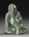 A CHINESE CELADON FIGURE CENSER,  MING DYNASTY, 15TH CENTURY