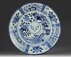 A JAPANESE ARITA BLUE AND WHITE V.O.C. DISH, 19TH CENTURY