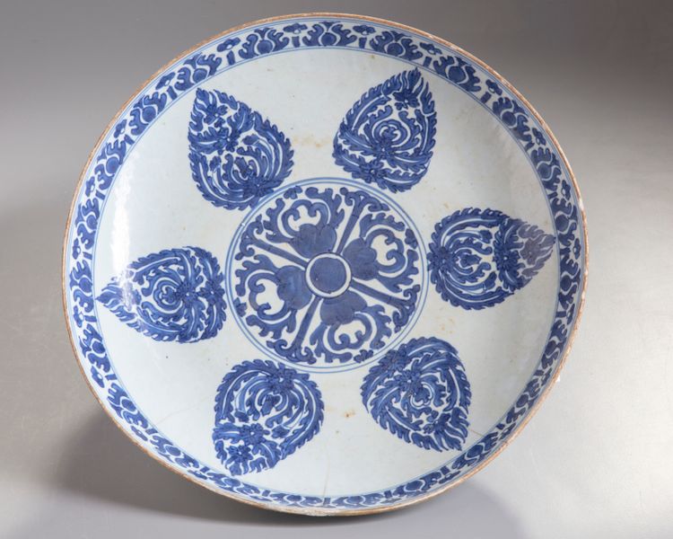 A blue and white charger