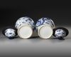 A PAIR OF CHINESE BLUE AND WHITE GINGER POTS