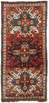 AN ADLER KAZAK CARPET.