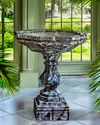 A CARVED VARIEGATED GREEN MARBLE BASIN OR CISTERN, LATE 19TH OR EARLY 20TH CENTURY