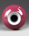 A CHINESE RUBY GLAZED MONOCHROME VASE, QING DYNASTY (1644-1911)
