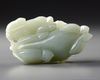 A CHINESE CELADON JADE CARVING OF A WATER BUFFALO GROUP, 19TH-20TH CENTURY