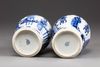 Two similar moulded Chinese blue and white twin-handled vases