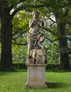A SCULPTED LIMESTONE GARDEN MODEL OF PAN, SECOND HALF 20TH CENTURY