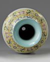 A Chinese yellow ground fmille rose ‘flowers of the four seasons’ vase
