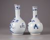 A pair of Chinese blue and white ‘peony’ bottle vase