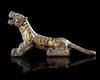 A CHINESE BRONZE 'TIGER' SCROLL WEIGHT, HAN DYNASTY (206 BC-220 AD) OR LATER