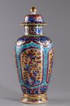 A later-enamelled Chinese blue and white vase and cover