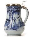 A JAPANESE BLUE AND WHITE JUG WITH SILVER COVER, 17TH CENTURY