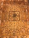 AN EMBROIDERED HANGING PANEL