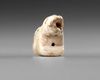 A LION AMULET IN SHELL, CIRCA 3500 BC