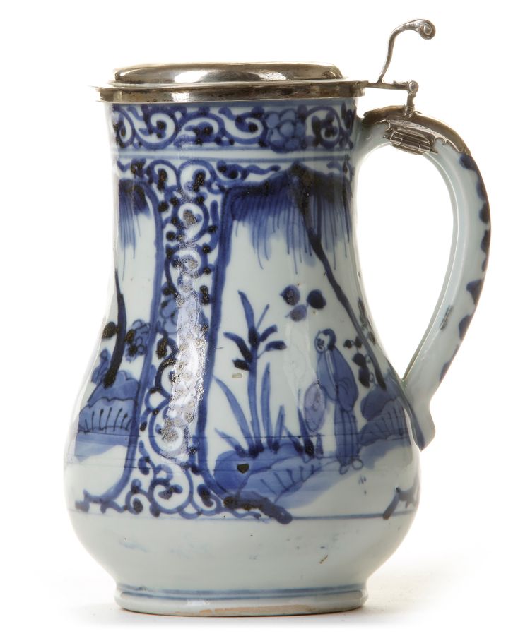 A JAPANESE BLUE AND WHITE JUG WITH SILVER COVER, 17TH CENTURY