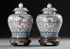 A PAIR OF FAMILLE ROSE VASES WITH LIDS ON WOODEN STANDS, CHINA, 19TH CENTURY