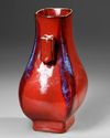A CHINESE MONOCHROME COPPER RED-GLAZED VASE, FANGHU, 19TH CENTURY
