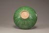 An emerald-green-glazed bowl