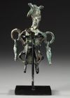 A WESTERN ASIATIC AMLASH OPENWORK BRONZE IDOL, CIRCA 1ST MILLENNIUM B.C.