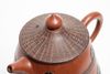 A Chinese yixing three-tiered tapering teapot and cover