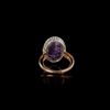 AN ANTIQUE RING WITH A ROMAN AMETHYST INTAGLIO, 1ST CENTURY AD, 18TH CENTURY RING