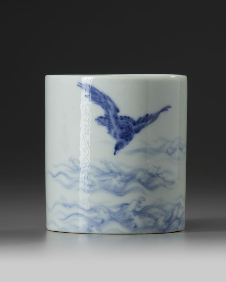 A small Chinese blue and white ‘bird and waves’ brush pot, bitong