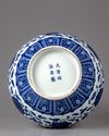 A blue and white bottle vase