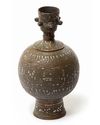A KHORASSAN STYLE INLAID BRONZE VASE, 19TH CENTURY