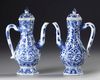 A PAIR OF CHINESE BLUE AND WHITE HEXAGONAL EWERS AND COVERS, KANGXI PERIOD (1662–1722)