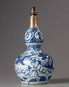 A silver-mounted Chinese blue and white ‘dragon’ double gourd vase