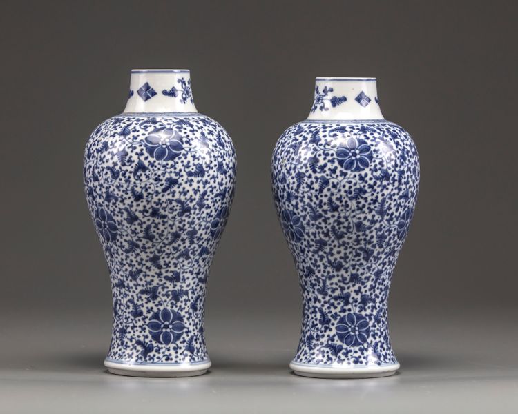 A pair of Chinese blue and white floral vases