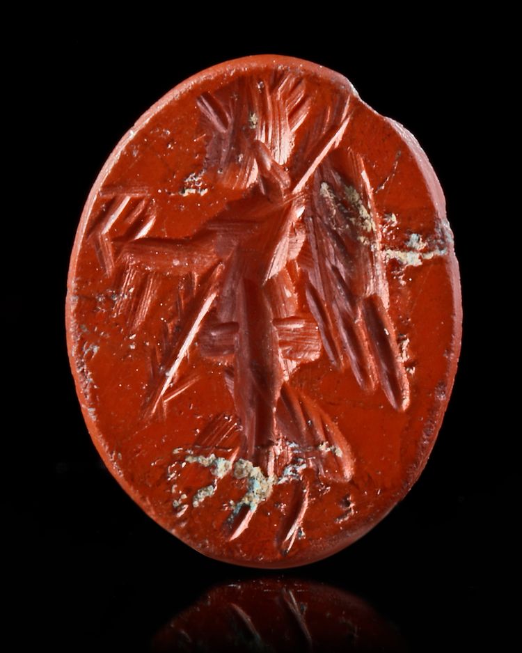 A ROMAN RED JASPER INTAGLIO OF VICTORY, 2ND CENTURY AD